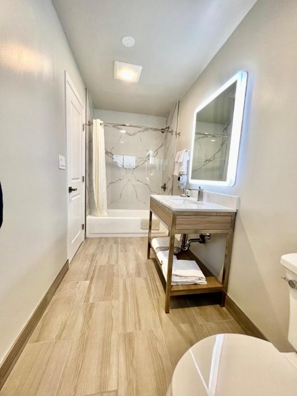 Spacious bathroom with vanity at Francisco Bay Inn