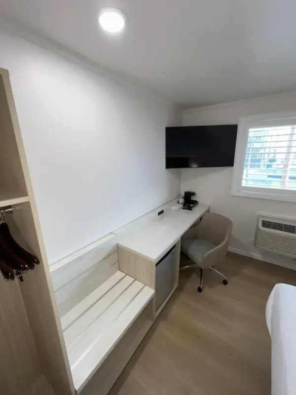 Desk and seating area in Francisco Bay Inn room
